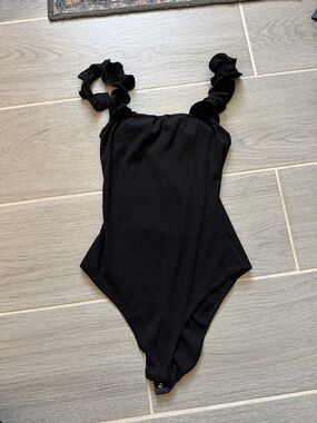 Kittenish Black Ruffle Strap Ribbed Bodysuit
